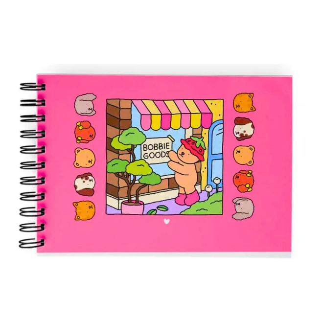 Livros falsos de Bobbie Goods, como este da imagem, possuem encadernação em espiral, ao contrário da lombada reta dos oficiais (Imagem: Papelaria Art Pel/Reprodução)