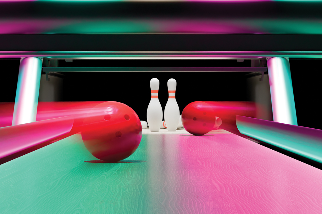 Imagem de uma pista de boliche. Vê-se dois pinos prestes a serem derrubados por duas bolas.